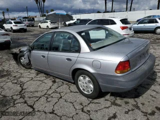 1996 Saturn SL with VIN 1G8ZH5288TZ156412, listed as a Copart auction lot 44429465 with 141,560 mi miles and Salvage Title. Bid and sale history available at carsss.com. Image 2.