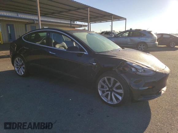 2019 Tesla Model 3 Mid Range with VIN 5YJ3E1EA6KF436152, listed as a Copart auction lot 50399265 with 62,676 mi miles and Salvage Title. Bid and sale history available at DreamBid. Image 4.
