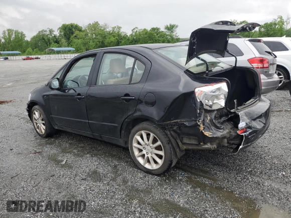 2011 Suzuki SX4 LE z VIN JS2YC5A28B6300625, wystawiony jako Copart lot #54044155 z przebiegiem 179 269 mil mil oraz Szkoda całkowita • Salvage title. Historia ofert i sprzedaży dostępna na DreamBid. Obrazek 2.