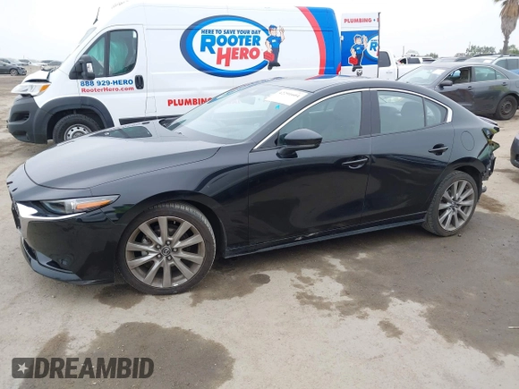 2021 Mazda 3 Premium with VIN JM1BPADL4M1329041, listed as a IAAI auction lot 42291604 with 93,248 mi miles and . Bid and sale history available at DreamBid. Image 15.