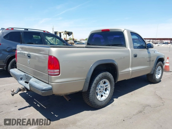 2002 Dodge Dakota with VIN 1B7FL16X72S642881, listed as a IAAI auction lot 42153560 with 220,917 mi miles and . Bid and sale history available at carsss.com. Image 4.
