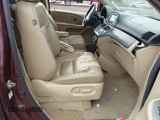 2009 Honda Odyssey Touring with VIN 5FNRL38929B037150, listed as a IAAI auction lot 42319657 with 183,663 mi miles and . Bid and sale history available at DreamBid. Image 5.