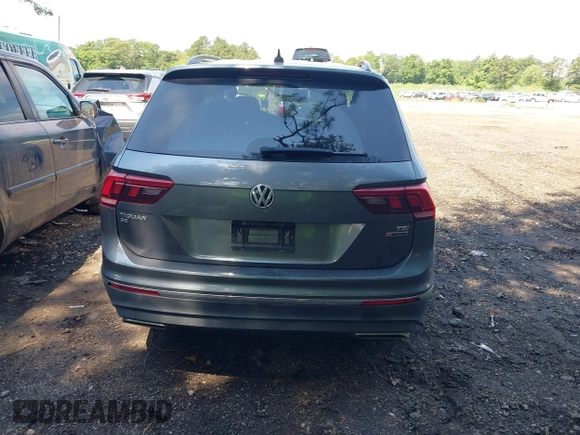 2018 Volkswagen Tiguan SEL with VIN 3VV2B7AXXJM020392, listed as a IAAI auction lot 42646948 with 58,685 mi miles and . Bid and sale history available at DreamBid. Image 16.