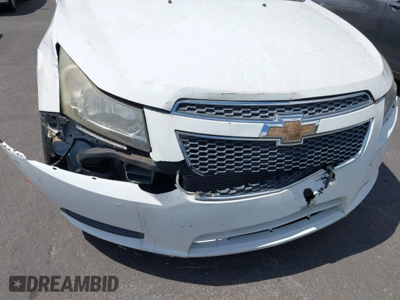 2014 Chevrolet Cruze 1LT with VIN 1G1PC5SB4E7132171, listed as a IAAI auction lot 42532531 with 132,012 mi miles and . Bid and sale history available at DreamBid. Image 13.