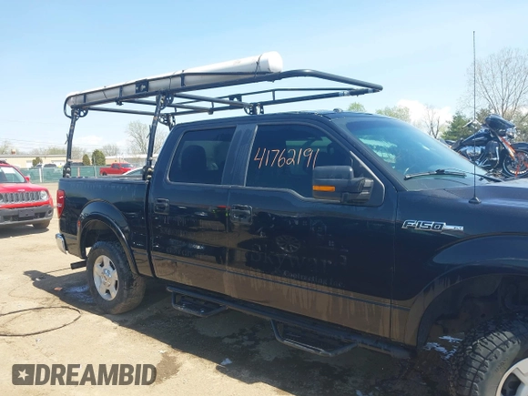 2014 Ford F-150 XL with VIN 1FTFW1EF0EFC98677, listed as a IAAI auction lot 41762191 with 212,626 mi miles. Bid and sale history available at carsss.com. Image 13.