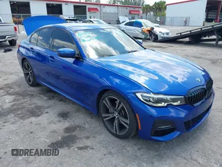 2021 BMW 3 Series 330i z VIN 3MW5R1J0XM8B54157, wystawiony jako IAAI lot #42292193 z przebiegiem 60 589 mil mil oraz . Historia ofert i sprzedaży dostępna na DreamBid. Obrazek 1.
