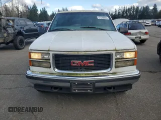 1997 GMC Yukon with VIN 1GKEK13R5VJ762200, listed as a Copart auction lot 47579745 with 165,573 mi miles and Clean Title. Bid and sale history available at carsss.com. Image 5.