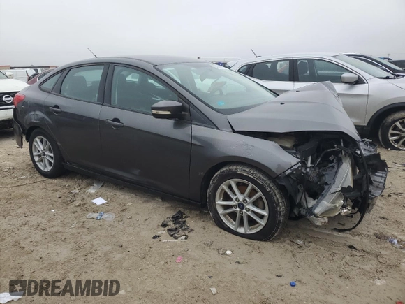 2017 Ford Focus SE с VIN 1FADP3F25HL205076, выставлен на аукционе Copart как лот 43329075 с пробегом 77 165 миль миль и Списание • Salvage title. История ставок и продаж доступна на DreamBid. Изображение 4.