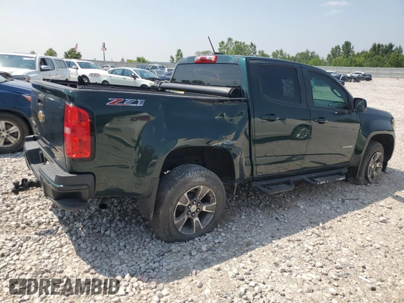 2015 Chevrolet Colorado 4WD Z71 with VIN 1GCGTCE35F1149677, listed as a Copart auction lot 64271015 with 39,671 mi miles and Clean title. Bid and sale history available at DreamBid. Image 3.