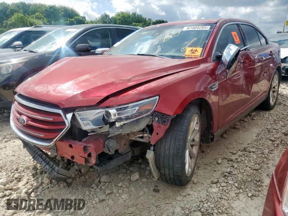 2014 Ford Taurus Limited with VIN 1FAHP2F89EG186567, listed as a Copart auction lot 61404285 with 188,890 mi miles and Salvage title. Bid and sale history available at DreamBid. Image 1.