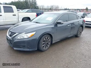 2018 Nissan Altima 2.5 SL with VIN 1N4AL3AP2JC210596, listed as a IAAI auction lot 41852215 with 100,540 mi miles. Bid and sale history available at carsss.com. Image 18.