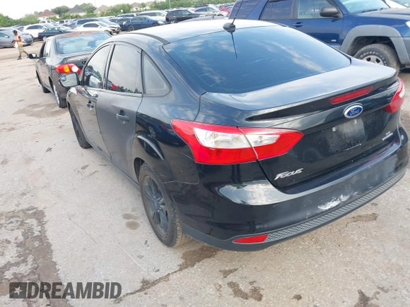 2014 Ford Focus SE with VIN 1FADP3F21EL157488, listed as a IAAI auction lot 42120325 with 198,658 mi miles and . Bid and sale history available at DreamBid. Image 3.