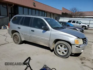 2005 GMC Envoy SLE with VIN 1GKDT13S652171203, listed as a Copart auction lot 49087815 with 292,815 mi miles and Salvage Title. Bid and sale history available at carsss.com. Image 4.