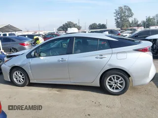 2016 Toyota Prius Two z VIN JTDKBRFU1G3016850, wystawiony jako IAAI lot #41163246 z przebiegiem 68 858 mil mil oraz . Historia ofert i sprzedaży dostępna na DreamBid. Obrazek 14.