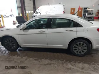 2013 Chrysler 200 Touring with VIN 1C3CCBBB2DN592416, listed as a IAAI auction lot 41732350 with 121,579 mi miles and . Bid and sale history available at carsss.com. Image 14.