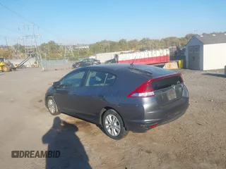 2012 Honda Insight EX z VIN JHMZE2H70CS004787, wystawiony jako IAAI lot #40668475 z przebiegiem 127 599 mil mil oraz . Historia ofert i sprzedaży dostępna na DreamBid. Obrazek 3.