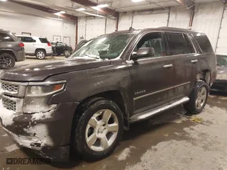 2015 Chevrolet Tahoe LT with VIN 1GNSKBKC9FR126603, listed as a IAAI auction lot 41378759 with 1 mi miles. Bid and sale history available at carsss.com. Image 2.