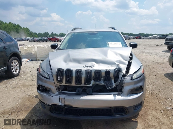 2016 Jeep Cherokee Altitude with VIN 1C4PJLAB7GW307900, listed as a IAAI auction lot 42611390 with 130,123 mi miles and . Bid and sale history available at DreamBid. Image 13.