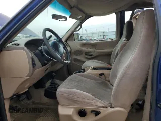 1997 Ford F-150 XL with VIN 1FTDX18W3VKC25911, listed as a Copart auction lot 44074305 with 184,409 mi miles and Salvage Title. Bid and sale history available at carsss.com. Image 7.