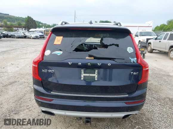 2016 Volvo XC90 T6 Momentum with VIN YV4A22PK7G1058660, listed as a IAAI auction lot 42201130 with 130,487 mi miles. Bid and sale history available at carsss.com. Image 17.