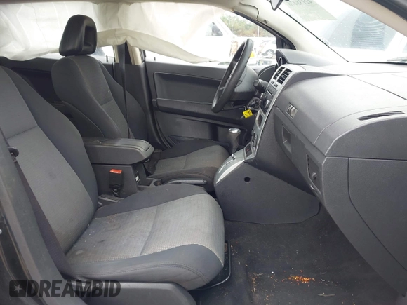 2009 Dodge Caliber SXT z VIN 1B3HB48A79D236542, wystawiony jako IAAI lot #42138476 z przebiegiem Nie podano mil oraz . Historia ofert i sprzedaży dostępna na DreamBid. Obrazek 5.