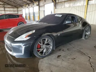 2014 Nissan 370Z with VIN JN1AZ4EH8EM631162, listed as a Copart auction lot 82346554 with 122,064 mi miles and Salvage Title. Bid and sale history available at carsss.com. Image 1.