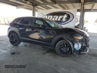 2024 Mazda CX-30 S Select Sport with VIN 3MVDMBBM0RM699317, listed as a Copart auction lot 63411325 with 30,364 mi miles and Clean title. Bid and sale history available at DreamBid. Image 4.