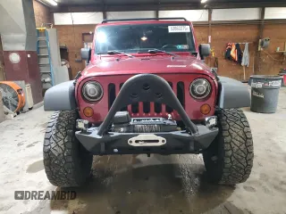 2012 Jeep Wrangler Unlimited Sport z VIN 1C4BJWDG8CL282181, wystawiony jako Copart lot #53863375 z przebiegiem 92 984 mil mil oraz Szkoda całkowita • Salvage title. Historia ofert i sprzedaży dostępna na DreamBid. Obrazek 5.