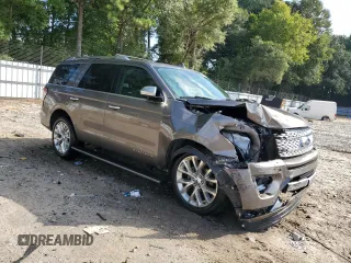 2019 Ford Expedition Platinum with VIN 1FMJU1LT2KEA16948, listed as a Copart auction lot 71663304 with 88,009 mi miles and Salvage Title. Bid and sale history available at carsss.com. Image 4.