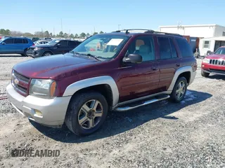 2006 Chevrolet TrailBlazer LT with VIN 1GNES13M262161488, listed as a IAAI auction lot 41774799 with 214,132 mi miles. Bid and sale history available at carsss.com. Image 2.