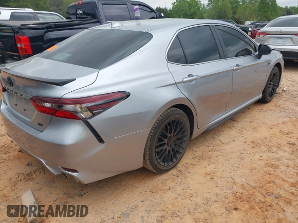 2023 Toyota Camry SE with VIN 4T1T11AK1PU736752, listed as a IAAI auction lot 41986290 with 38,636 mi miles and . Bid and sale history available at DreamBid. Image 4.