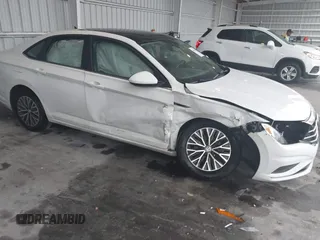 2019 Volkswagen Jetta SEL z VIN 3VWEB7BU9KM166586, wystawiony jako IAAI lot #41382619 z przebiegiem 39 872 mil mil oraz . Historia ofert i sprzedaży dostępna na DreamBid. Obrazek 1.