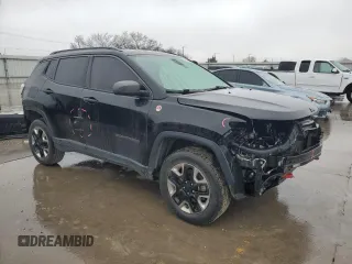 2018 Jeep Compass Trailhawk with VIN 3C4NJDDB6JT456305, listed as a Copart auction lot 44175405 with 124,636 mi miles and Salvage Title. Bid and sale history available at carsss.com. Image 4.