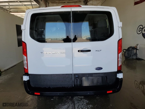 2022 Ford Transit Passenger Wagon XL with VIN 1FBAX2Y87NKA84176, listed as a Copart auction lot 50800985 with 77,909 mi miles and Clean Title. Bid and sale history available at carsss.com. Image 6.