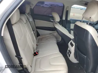 2017 Ford Edge Titanium z VIN 2FMPK3K95HBB59849, wystawiony jako Copart lot #54627325 z przebiegiem 136 548 mil mil oraz Szkoda całkowita • Salvage title. Historia ofert i sprzedaży dostępna na DreamBid. Obrazek 11.