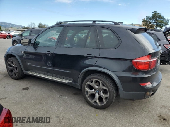 2011 BMW X5 35i z VIN 5UXZV4C59BL741822, wystawiony jako Copart lot #47702585 z przebiegiem 199 314 mil mil oraz Czysty tytuł • Clean title. Historia ofert i sprzedaży dostępna na DreamBid. Obrazek 2.