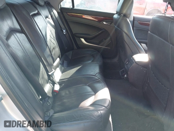 2013 Cadillac CTS Premium with VIN 1G6DP5E39D0100975, listed as a IAAI auction lot 41915113 with 110,436 mi miles and . Bid and sale history available at DreamBid. Image 8.