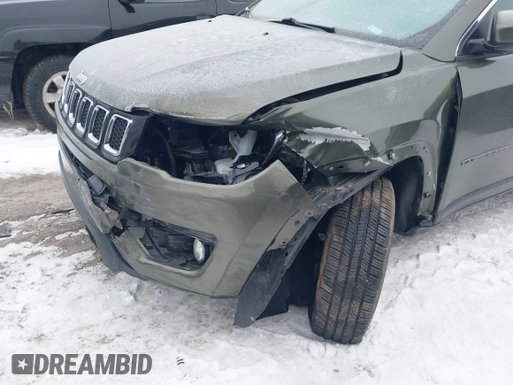 2018 Jeep Compass Altitude with VIN 3C4NJDBB1JT479462, listed as a IAAI auction lot 41276119 with 58,895 mi miles and . Bid and sale history available at carsss.com. Image 6.