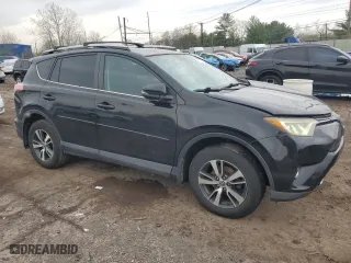 2016 Toyota RAV4 XLE with VIN 2T3RFREV0GW528206, listed as a Copart auction lot 53178735 with 131,996 mi miles and Salvage Title. Bid and sale history available at carsss.com. Image 4.