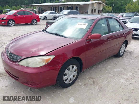 2002 Toyota Camry LE z VIN 4T1BE30K32U110304, wystawiony jako IAAI lot #42357455 z przebiegiem 221 389 mil mil oraz . Historia ofert i sprzedaży dostępna na DreamBid. Obrazek 17.
