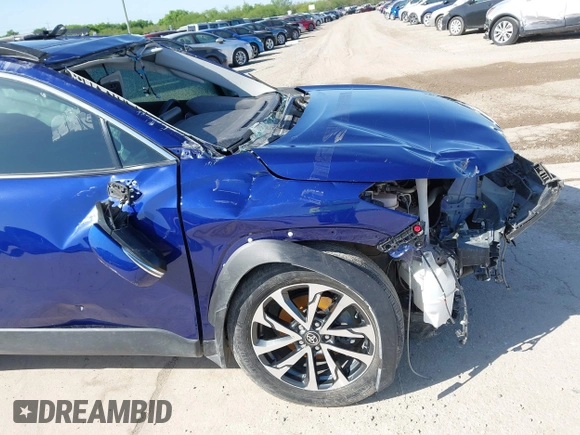 2022 Toyota Corolla Cross XLE with VIN 7MUDAAAG8NV027585, listed as a IAAI auction lot 41781177 with 36,841 mi miles and . Bid and sale history available at DreamBid. Image 14.