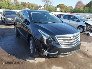 2018 Cadillac XT5 Luxury AWD with VIN 1GYKNDRS6JZ199827, listed as a IAAI auction lot 40699590 with 92,557 mi miles and . Bid and sale history available at DreamBid. Image 1.