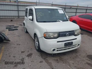 2010 Nissan Cube S z VIN JN8AZ2KRXAT158531, wystawiony jako IAAI lot #41899452 z przebiegiem 149 804 mil mil oraz . Historia ofert i sprzedaży dostępna na DreamBid. Obrazek 1.