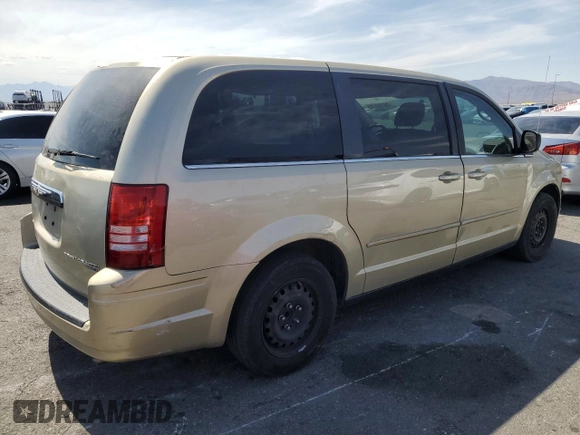 2010 Chrysler Town & Country LX with VIN 2A4RR4DE0AR188949, listed as a Copart auction lot 54140515 with 185,534 mi miles and Salvage Title. Bid and sale history available at DreamBid. Image 3.