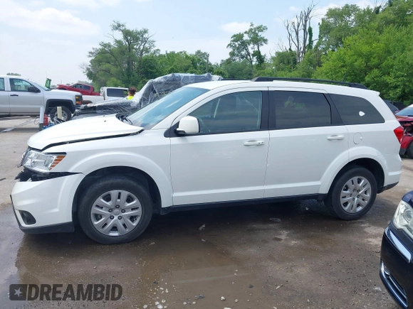 2019 Dodge Journey SE with VIN 3C4PDCBB6KT833777, listed as a IAAI auction lot 42411738 with 32,133 mi miles and . Bid and sale history available at DreamBid. Image 14.