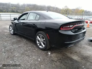 2022 Dodge Charger SXT with VIN 2C3CDXJG3NH206345, listed as a IAAI auction lot 40844458 with 49,387 mi miles. Bid and sale history available at carsss.com. Image 3.
