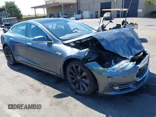 2014 Tesla Model S 60 with VIN 5YJSA1H19EFP36971, listed as a IAAI auction lot 42525811 with Not provided miles and . Bid and sale history available at DreamBid. Image 1.