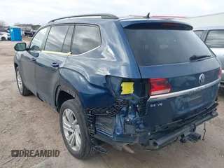 2021 Volkswagen Atlas SE z VIN 1V2JR2CA3MC555490, wystawiony jako IAAI lot #41286240 z przebiegiem 89 435 mil mil oraz . Historia ofert i sprzedaży dostępna na DreamBid. Obrazek 3.
