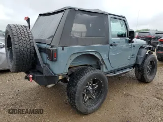 2014 Jeep Wrangler Sport с VIN 1C4AJWAG1EL117219, выставлен на аукционе Copart как лот 59696355 с пробегом 105 865 миль миль и Списание • Salvage title. История ставок и продаж доступна на DreamBid. Изображение 3.