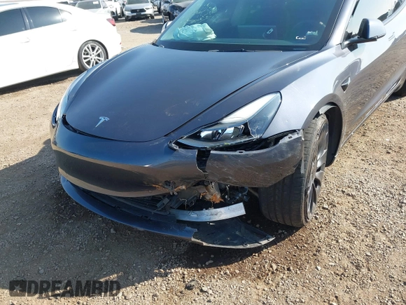 2022 Tesla Model 3 Performance with VIN 5YJ3E1ECXNF264830, listed as a IAAI auction lot 41625494 with Not Provided miles and . Bid and sale history available at carsss.com. Image 6.